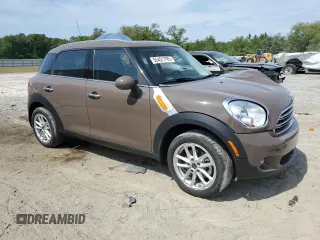 2015 MINI Countryman with VIN WMWZB3C55FWR46334, listed as a Copart auction lot 55421795 with 33,135 mi miles and Salvage Title. Bid and sale history available at DreamBid. Image 4.