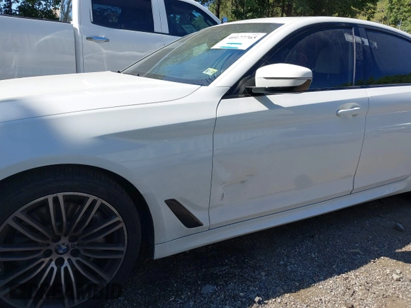 2019 BMW 5 Series 540i xDrive with VIN WBAJE7C52KWW14938, listed as a IAAI auction lot 40177765 with 57,722 mi miles and . Bid and sale history available at carsss.com. Image 6.