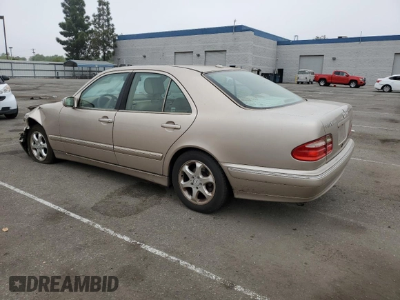 2002 Mercedes-Benz E-Class with VIN WDBJF65J92B404315, listed as a Copart auction lot 75481094 with 87,383 mi miles and Salvage Title. Bid and sale history available at carsss.com. Image 2.