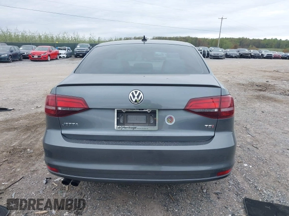 2016 Volkswagen Jetta Sport z VIN 3VWD17AJ2GM399335, wystawiony jako IAAI lot #42077435 z przebiegiem 92 284 mil mil oraz . Historia ofert i sprzedaży dostępna na DreamBid. Obrazek 16.
