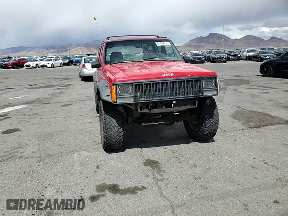 1996 Jeep Cherokee Sport with VIN 1J4FJ68S6TL213886, listed as a Copart auction lot 51462275 with 215,091 mi miles and Salvage title. Bid and sale history available at DreamBid. Image 12.