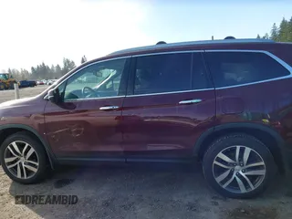 2016 Honda Pilot Touring with VIN 5FNYF6H99GB094933, listed as a IAAI auction lot 41967730 with 98,841 mi miles. Bid and sale history available at carsss.com. Image 14.