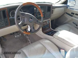 2004 Cadillac Escalade EXT z VIN 3GYEK62N94G191201, wystawiony jako IAAI lot #41747841 z przebiegiem 229 057 mil mil oraz . Historia ofert i sprzedaży dostępna na DreamBid. Obrazek 13.