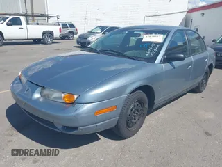 2002 Saturn SL z VIN 1G8ZS52862Z269002, wystawiony jako IAAI lot #42079357 z przebiegiem 250 721 mil mil oraz . Historia ofert i sprzedaży dostępna na DreamBid. Obrazek 2.