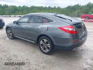 2013 Honda Crosstour EX-L z VIN 5J6TF1H56DL002352, wystawiony jako IAAI lot #42303791 z przebiegiem 178 443 mil mil oraz . Historia ofert i sprzedaży dostępna na DreamBid. Obrazek 3.