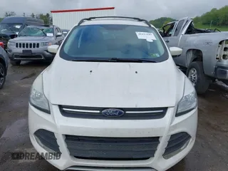 2015 Ford Escape SE with VIN 1FMCU9G91FUB27234, listed as a IAAI auction lot 42157947 with 210,034 mi miles. Bid and sale history available at carsss.com. Image 6.