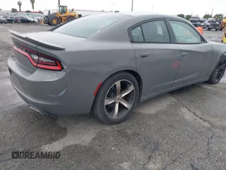 2017 Dodge Charger SE with VIN 2C3CDXBG7HH553583, listed as a IAAI auction lot 41925229 with 121,777 mi miles. Bid and sale history available at carsss.com. Image 4.