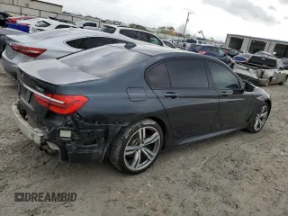 2018 BMW 7 Series 750i with VIN WBA7F0C55JGM23795, listed as a Copart auction lot 81168143 with 114,285 mi miles and Salvage Title. Bid and sale history available at carsss.com. Image 3.