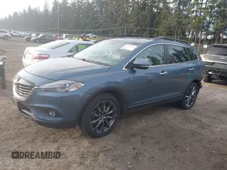 2014 Mazda CX-9 Grand Touring with VIN JM3TB3DV2E0435230, listed as a IAAI auction lot 41041440 with 145,538 mi miles and . Bid and sale history available at DreamBid. Image 19.