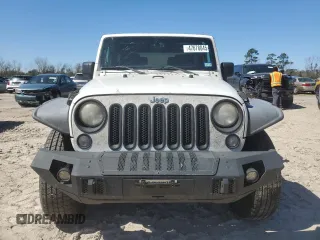 2014 Jeep Wrangler Sahara with VIN 1C4AJWBGXEL214269, listed as a Copart auction lot 47678045 with 283,634 mi miles and Clean Title. Bid and sale history available at DreamBid. Image 5.