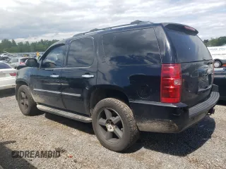 2009 Chevrolet Tahoe LTZ with VIN 1GNFK33039J125428, listed as a Copart auction lot 57962875 with 245,554 mi miles and Salvage title. Bid and sale history available at DreamBid. Image 2.