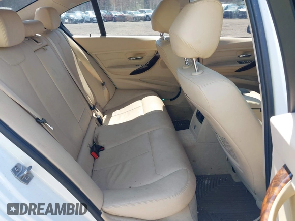 2013 BMW 3 Series 328i xDrive with VIN WBA3B5G53DNP40542, listed as a IAAI auction lot 42054817 with 70,924 mi miles and . Bid and sale history available at DreamBid. Image 8.