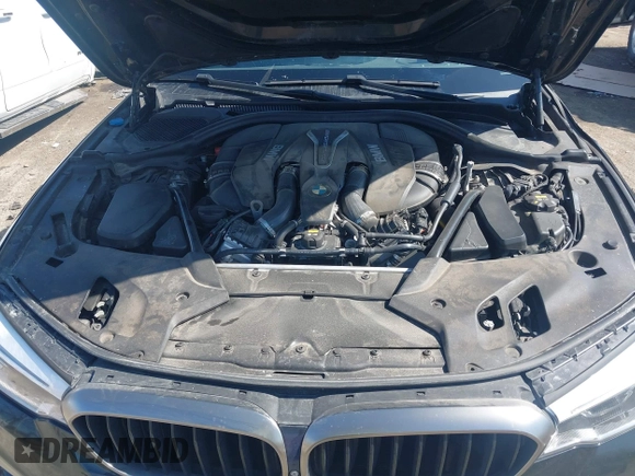 2019 BMW 5 Series M550i xDrive with VIN WBAJB9C51KB464879, listed as a IAAI auction lot 41774834 with 77,379 mi miles and . Bid and sale history available at DreamBid. Image 10.