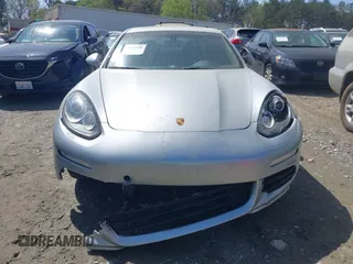 2014 Porsche Panamera z VIN WP0AA2A70EL007514, wystawiony jako IAAI lot #41910398 z przebiegiem 72 434 mil mil oraz . Historia ofert i sprzedaży dostępna na DreamBid. Obrazek 6.