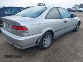 2000 Honda Civic HX with VIN 1HGEJ7125YL072433, listed as a IAAI auction lot 41960685 with 253,559 mi miles. Bid and sale history available at carsss.com. Image 4.