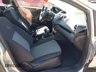 2017 Ford Fiesta S z VIN 3FADP4AJ0HM171227, wystawiony jako IAAI lot #41878411 z przebiegiem 88 558 mil mil oraz . Historia ofert i sprzedaży dostępna na DreamBid. Obrazek 5.