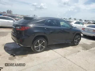 2016 Lexus RX 350 with VIN 2T2ZZMCA7GC012103, listed as a Copart auction lot 62763585 with 297,427 mi miles and Salvage title. Bid and sale history available at DreamBid. Image 3.
