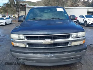 2005 Chevrolet Tahoe LT with VIN 1GNEC13T15R213638, listed as a IAAI auction lot 41787524 with 153,709 mi miles and . Bid and sale history available at DreamBid. Image 12.