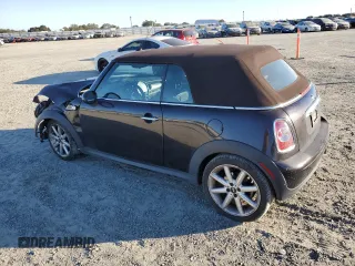 2015 MINI Convertible with VIN WMWZN3C53FT862859, listed as a Copart auction lot 71419764 with 113,356 mi miles and Salvage title. Bid and sale history available at DreamBid. Image 2.