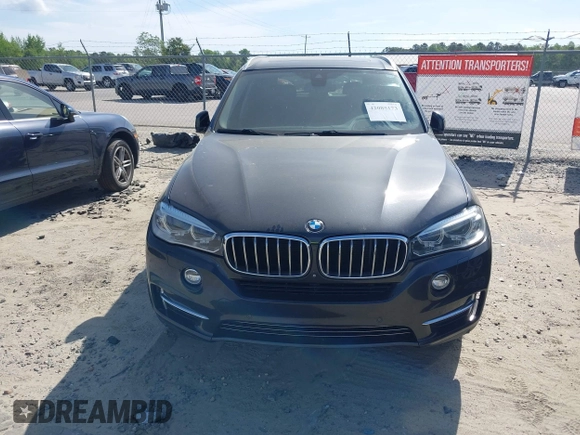 2014 BMW X5 xDrive35d with VIN 5UXKS4C57E0J93982, listed as a IAAI auction lot 42085173 with 169,908 mi miles. Bid and sale history available at carsss.com. Image 20.