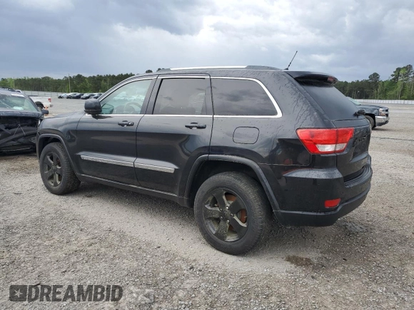 2013 Jeep Grand Cherokee Laredo with VIN 1C4RJFAG0DC641706, listed as a Copart auction lot 51704115 with 195,067 mi miles and Clean Title. Bid and sale history available at carsss.com. Image 2.