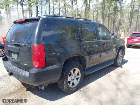 2007 GMC Yukon SLT with VIN 1GKFC13017R255432, listed as a IAAI auction lot 41908225 with 243,059 mi miles. Bid and sale history available at carsss.com. Image 4.