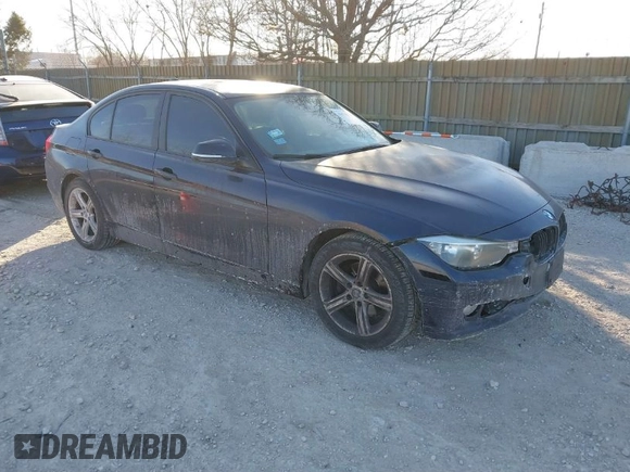 2013 BMW 3 Series 328i xDrive with VIN WBA3B5C57DF590497, listed as a IAAI auction lot 41424351 with 119,307 mi miles. Bid and sale history available at carsss.com. Image 1.