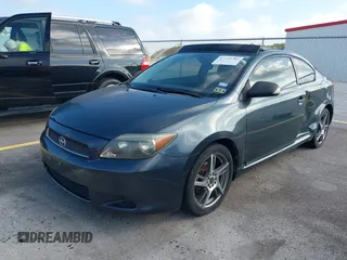 2006 Scion tC with VIN JTKDE167060074288, listed as a IAAI auction lot 37729781 with 119,836 mi miles. Bid and sale history available at carsss.com. Image 2.