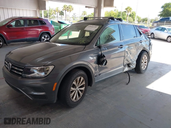 2018 Volkswagen Tiguan SEL with VIN 3VV3B7AXXJM213579, listed as a IAAI auction lot 42664339 with 84,676 mi miles and . Bid and sale history available at DreamBid. Image 17.