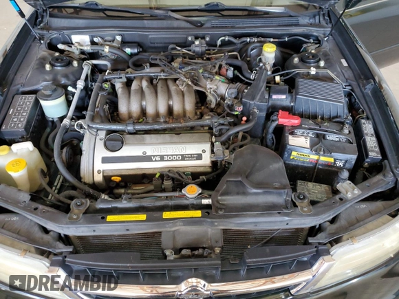 1999 Nissan Maxima GXE z VIN JN1CA21D0XT808755, wystawiony jako Copart lot #49693685 z przebiegiem 63 389 mil mil oraz Szkoda całkowita • Salvage title. Historia ofert i sprzedaży dostępna na DreamBid. Obrazek 11.
