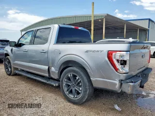2023 Ford F-150 XL with VIN 1FTEW1C57PFC27842, listed as a Copart auction lot 59906015 with 43,495 mi miles and Salvage title. Bid and sale history available at DreamBid. Image 2.