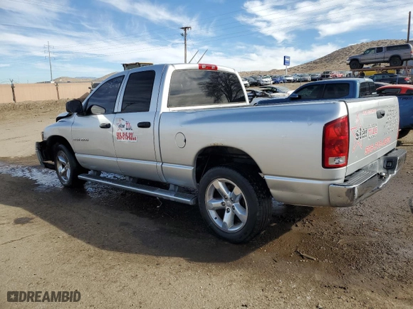 2005 Dodge Ram 1500 SLT with VIN 1D7HA18D55J573142, listed as a Copart auction lot 88745695 with 299,958 mi miles and Salvage Title. Bid and sale history available at carsss.com. Image 2.