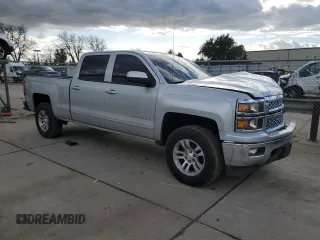 2015 Chevrolet Silverado 1500 LT with VIN 3GCPCREC3FG533011, listed as a Copart auction lot 45026255 with 118,852 mi miles and Salvage Title. Bid and sale history available at DreamBid. Image 4.