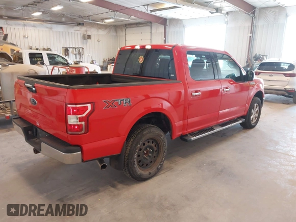 2018 Ford F-150 XL with VIN 1FTEW1E55JFA81946, listed as a IAAI auction lot 42128253 with 129,975 mi miles. Bid and sale history available at carsss.com. Image 4.