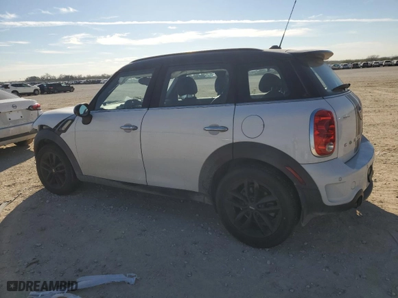 2014 MINI Cooper Countryman S with VIN WMWZC3C50EWT00792, listed as a Copart auction lot 87270074 with 52,525 mi miles and Salvage Title. Bid and sale history available at carsss.com. Image 2.