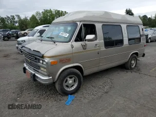 1992 Chevrolet Chevy Van z VIN 1GBEG25K2N7130047, wystawiony jako Copart lot #68682724 z przebiegiem 143 585 mil mil oraz Szkody całkowita. Historia ofert i sprzedaży dostępna na DreamBid. Obrazek 1.