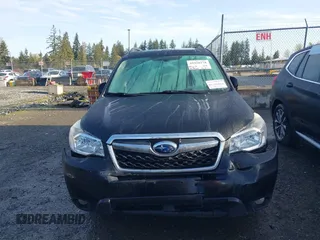 2014 Subaru Forester 2.5i Touring with VIN JF2SJAMC7EH406674, listed as a IAAI auction lot 41958178 with 190,866 mi miles. Bid and sale history available at carsss.com. Image 12.