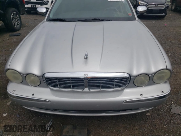 2005 Jaguar XJ Vanden Plas z VIN SAJWA82C15SG37427, wystawiony jako Copart lot #60749795 z przebiegiem 90 122 mil mil oraz Czysty tytuł • Clean title. Historia ofert i sprzedaży dostępna na DreamBid. Obrazek 11.