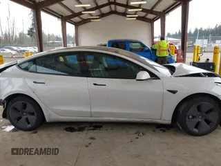 2023 Tesla Model 3 z VIN 5YJ3E1EA8PF412166, wystawiony jako IAAI lot #41461983 z przebiegiem 25 908 mil mil oraz . Historia ofert i sprzedaży dostępna na DreamBid. Obrazek 13.