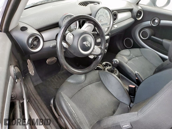 2010 MINI Hardtop S with VIN WMWMF7C51ATZ69061, listed as a Copart auction lot 60837465 with 102,506 mi miles and Salvage title. Bid and sale history available at DreamBid. Image 8.