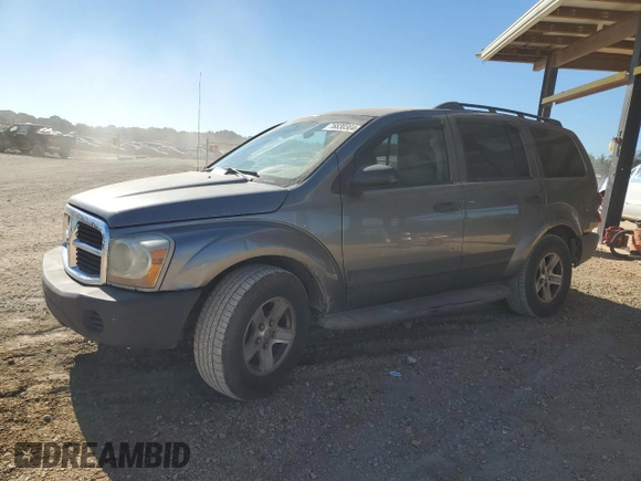 2006 Dodge Durango SXT with VIN 1D4HD38K86F110236, listed as a Copart auction lot 76830304 with 404,033 mi miles and Salvage title. Bid and sale history available at DreamBid. Image 1.