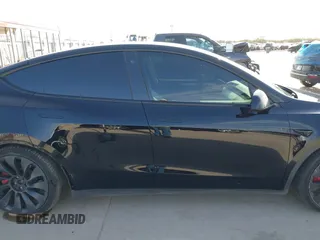 2022 Tesla Model Y Performance with VIN 7SAYGDEF6NF532027, listed as a IAAI auction lot 41717662 with 36,537 mi miles and . Bid and sale history available at DreamBid. Image 14.