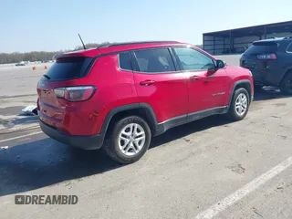 2018 Jeep Compass Sport with VIN 3C4NJCAB3JT255203, listed as a IAAI auction lot 42052746 with 112,451 mi miles and . Bid and sale history available at DreamBid. Image 4.