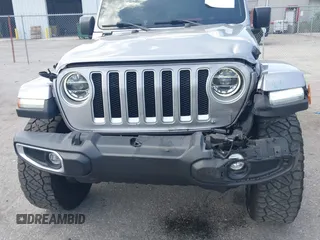 2021 Jeep Wrangler Unlimited Sahara with VIN 1C4HJXEN9MW637288, listed as a IAAI auction lot 42553459 with 39,362 mi miles and . Bid and sale history available at DreamBid. Image 6.