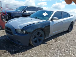 2013 Dodge Charger RT with VIN 2C3CDXCT4DH604611, listed as a IAAI auction lot 42196201 with 211,873 mi miles and . Bid and sale history available at carsss.com. Image 2.