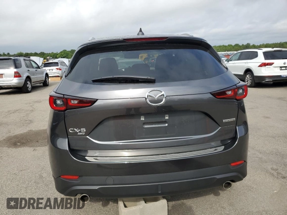 2023 Mazda CX-5 2.5 S Premium Package with VIN JM3KFBDM5P0229694, listed as a Copart auction lot 64811974 with 9,901 mi miles and Non Repairable. Bid and sale history available at carsss.com. Image 6.