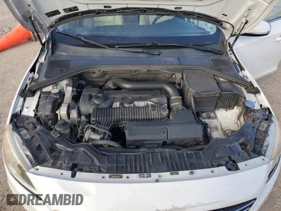 2014 Volvo S60 T5 z VIN YV1612FSXE2277644, wystawiony jako Copart lot #41397985 z przebiegiem 153 945 mil mil oraz Szkoda całkowita • Salvage title. Historia ofert i sprzedaży dostępna na DreamBid. Obrazek 12.