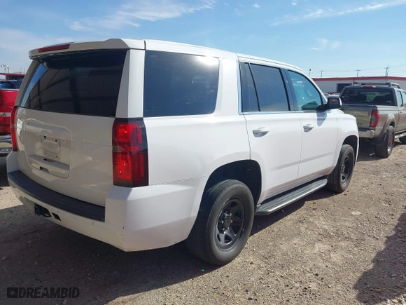 2018 Chevrolet Tahoe Commercial with VIN 1GNLCDEC0JR283440, listed as a IAAI auction lot 41280493 with 241,531 mi miles. Bid and sale history available at carsss.com. Image 4.