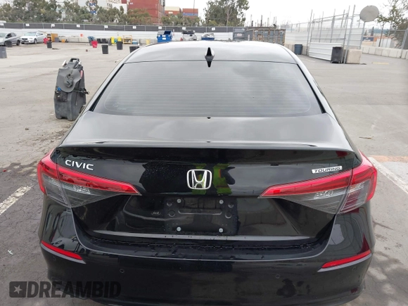 2022 Honda Civic Sedan Touring with VIN 2HGFE1F91NH308547, listed as a IAAI auction lot 41882514 with 39,249 mi miles. Bid and sale history available at carsss.com. Image 16.