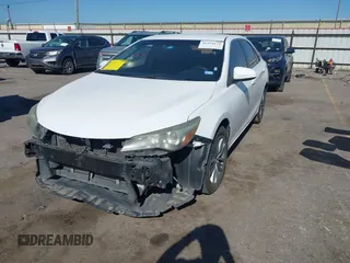 2015 Toyota Camry XLE with VIN 4T1BF1FK2FU001539, listed as a IAAI auction lot 41958674 with 163,758 mi miles and . Bid and sale history available at DreamBid. Image 2.